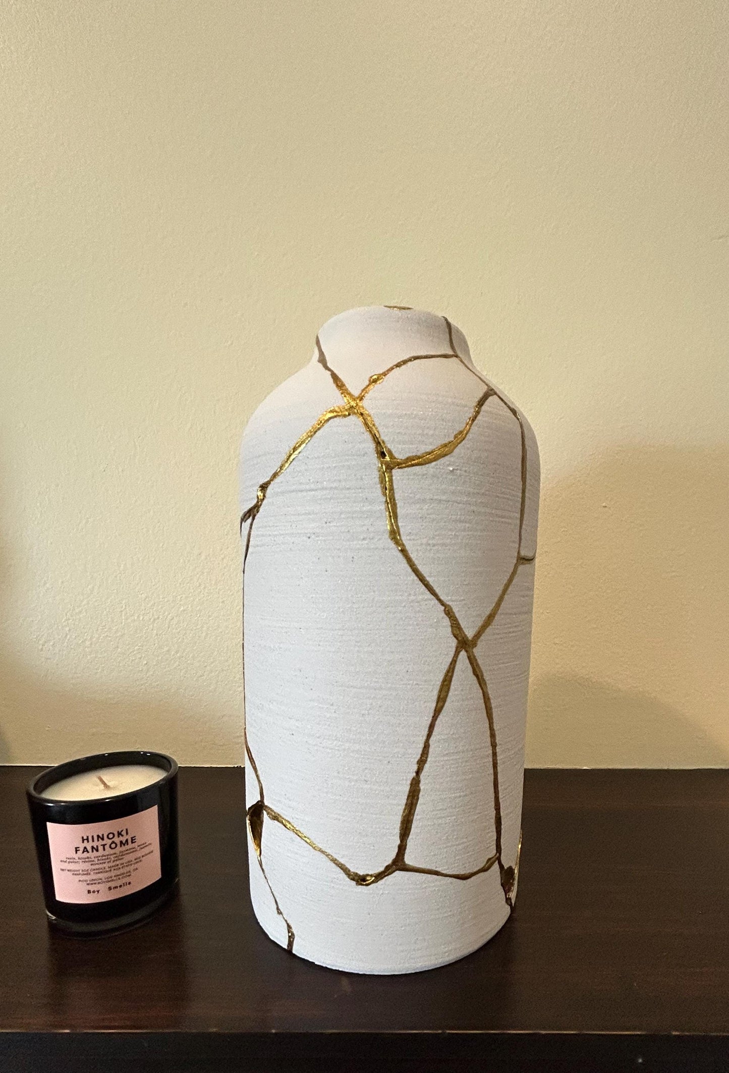 buy online luxury, bestseller, handmade, one of a kind, modern kintsugi japanese pottery art gift decorative cylinder vase for dried flowers in white with rough brushed horizontal texture and gold paint along break lines for sale