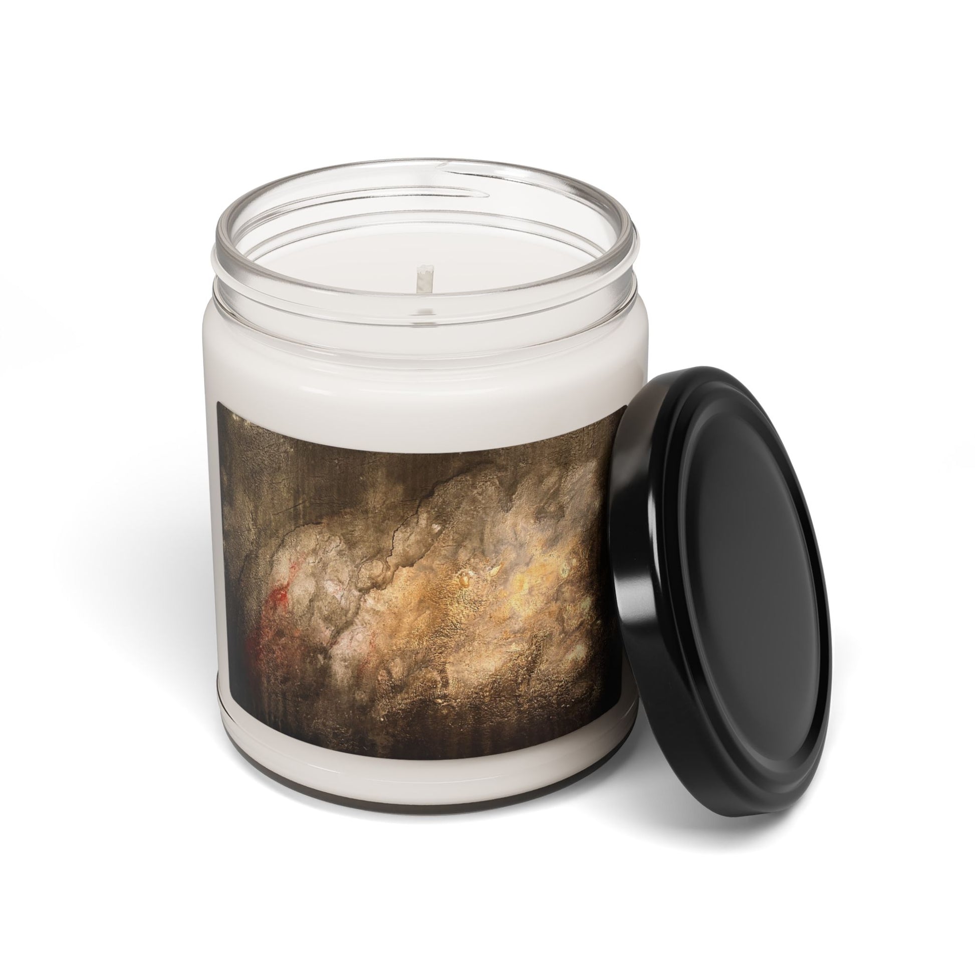9oz soy candle in clear glass jar with abstract textured painting label and black lid beside jar on white background