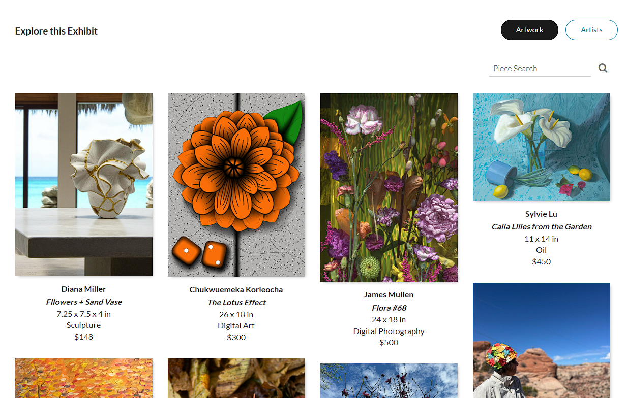 Sculptural vase with flowing white and beige organic shapes displayed on a wooden surface with ocean view background