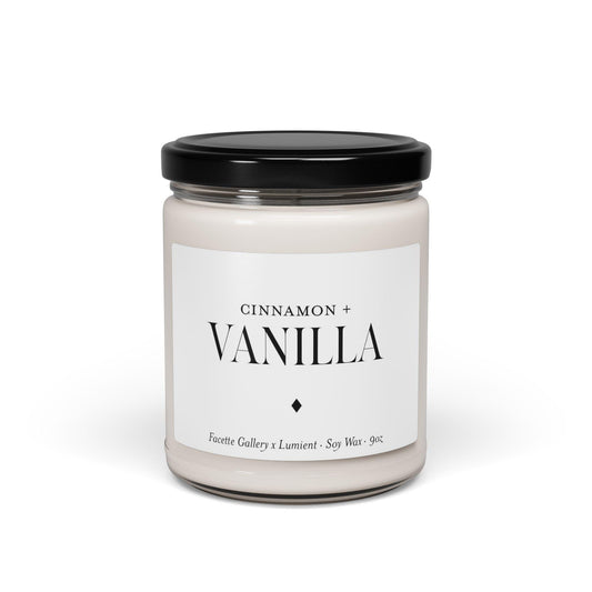 Cinnamon and vanilla scented vegan soy candle in clear glass jar with black lid and white minimalist label