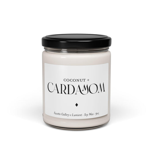 Coconut and cardamom scented vegan soy candle in clear glass jar with black lid and minimalist white label
