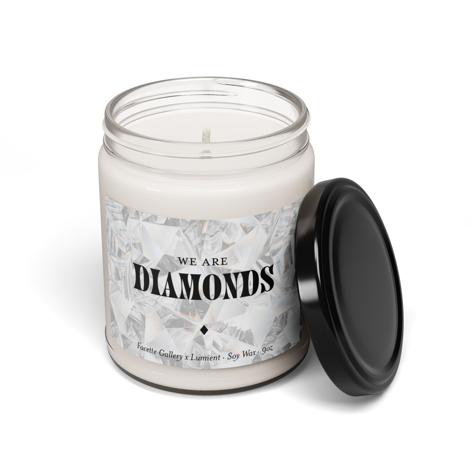 Facette Gallery Signature "We Are Diamonds" soy candle in 9oz glass jar with black lid on white background