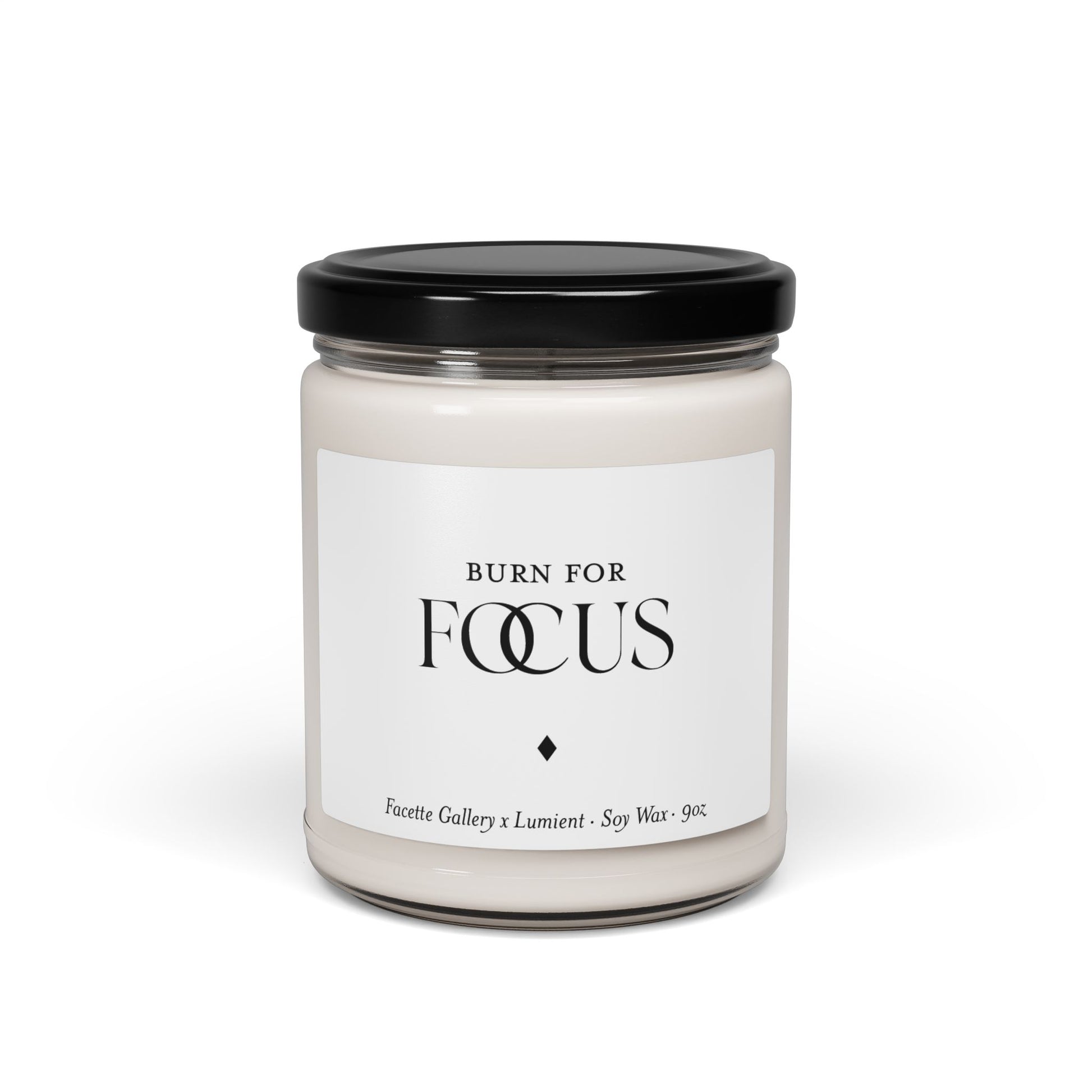 Focus candle in clear glass jar with black lid, white label, soy wax, 9oz size, minimalist design on white background