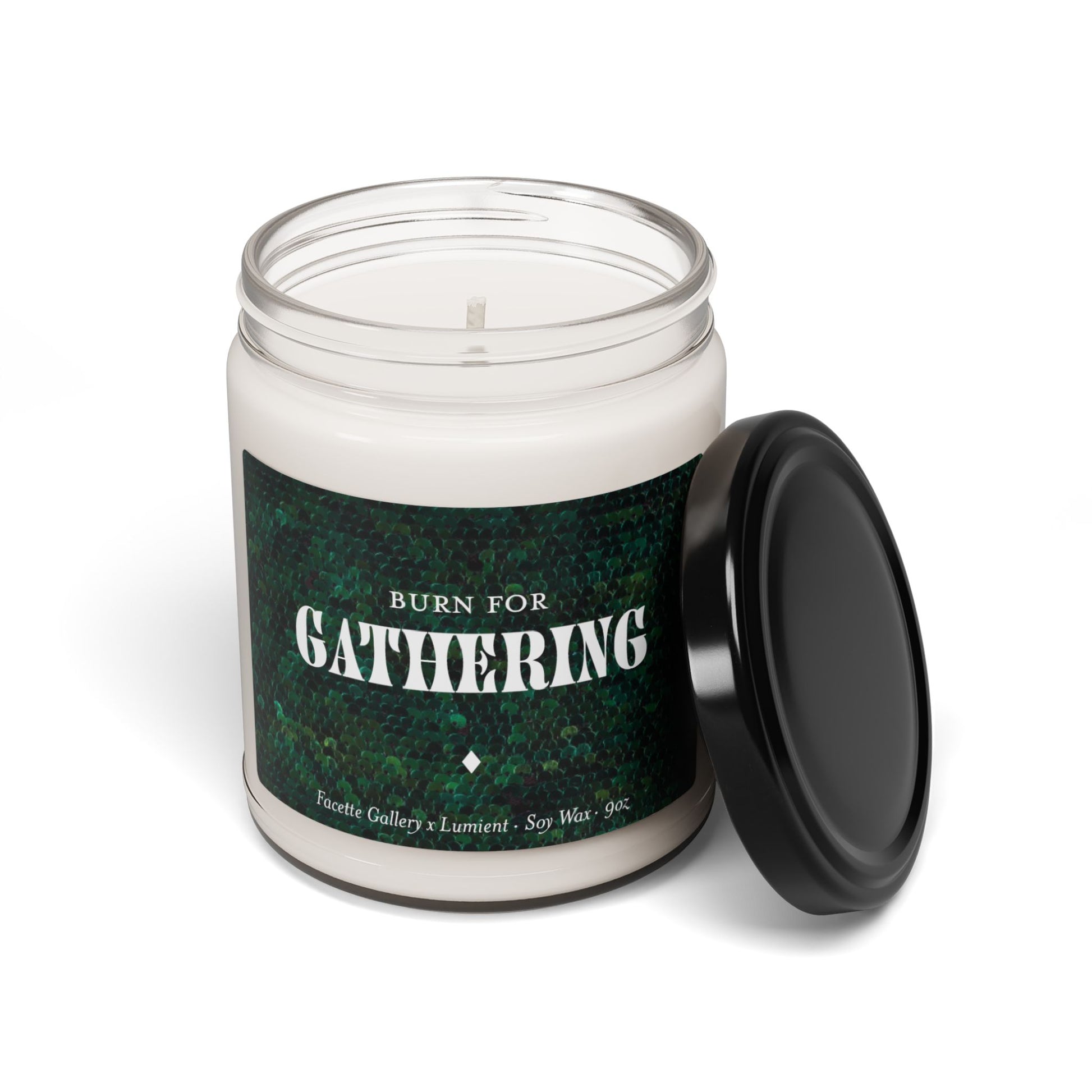 9oz soy wax candle in clear glass jar with green sequin label and black lid, scented for gathering ambiance