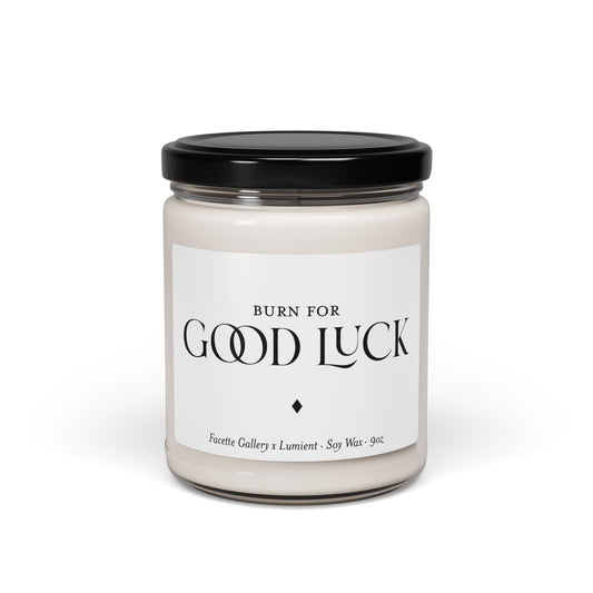 White soy wax candle in 9oz clear glass jar with black lid and "Good Luck" label in black text