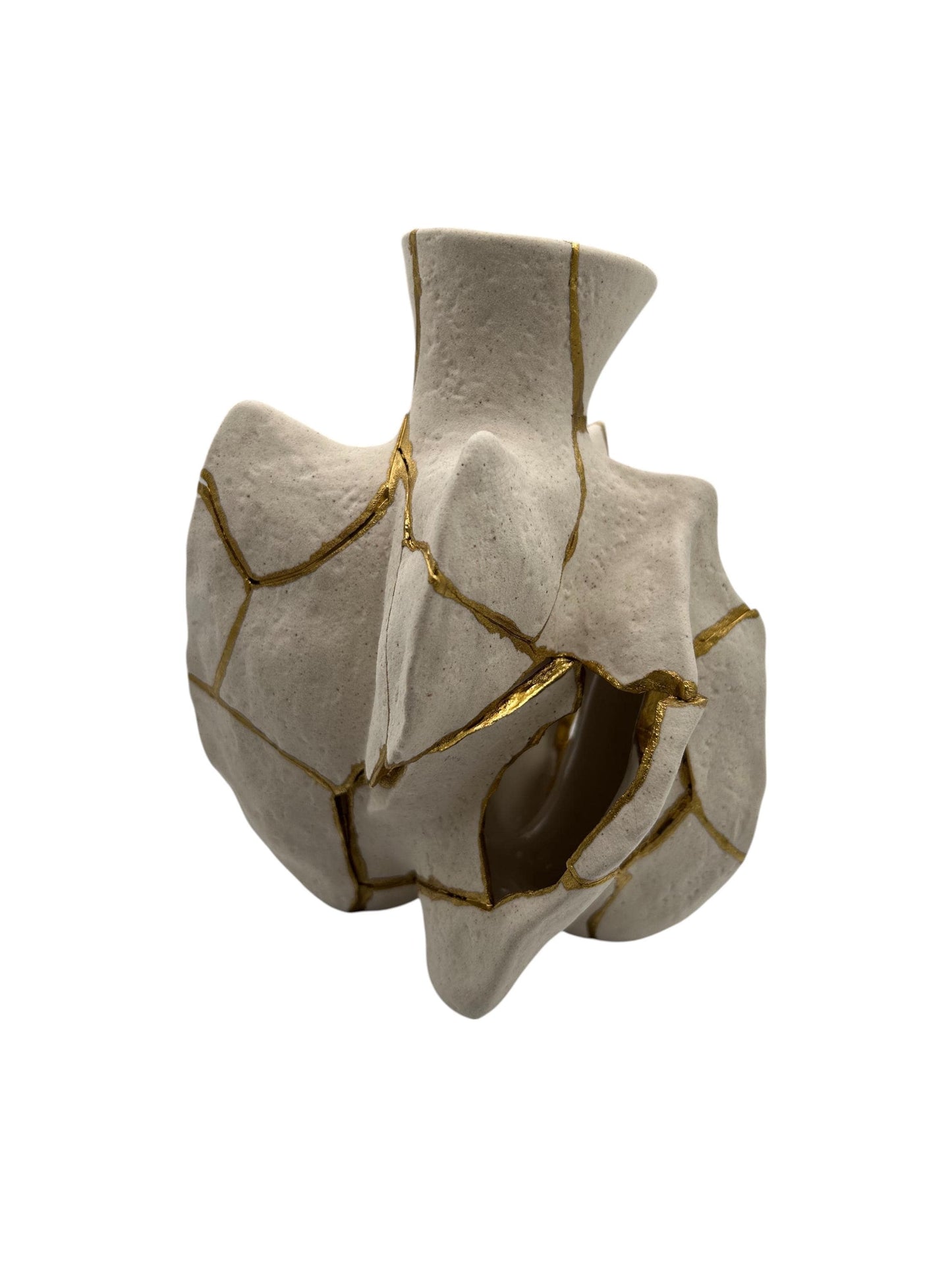 Modern Kintsugi fossil vase with hand-painted gold repairs on irregular ivory ceramic, 6.5in tall, decorative piece only.