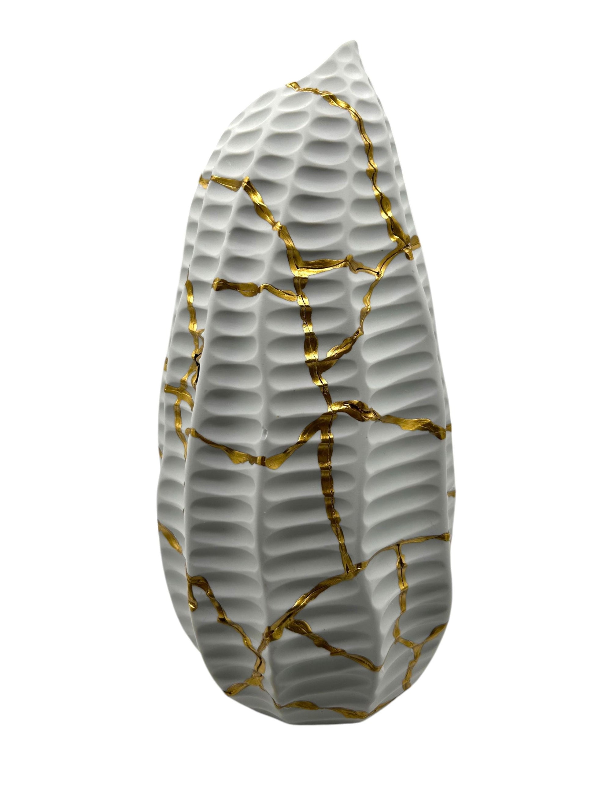 White ceramic Modern Kintsugi Seahorse Vase with hand-painted gold repairs, textured surface, 12in height on white background