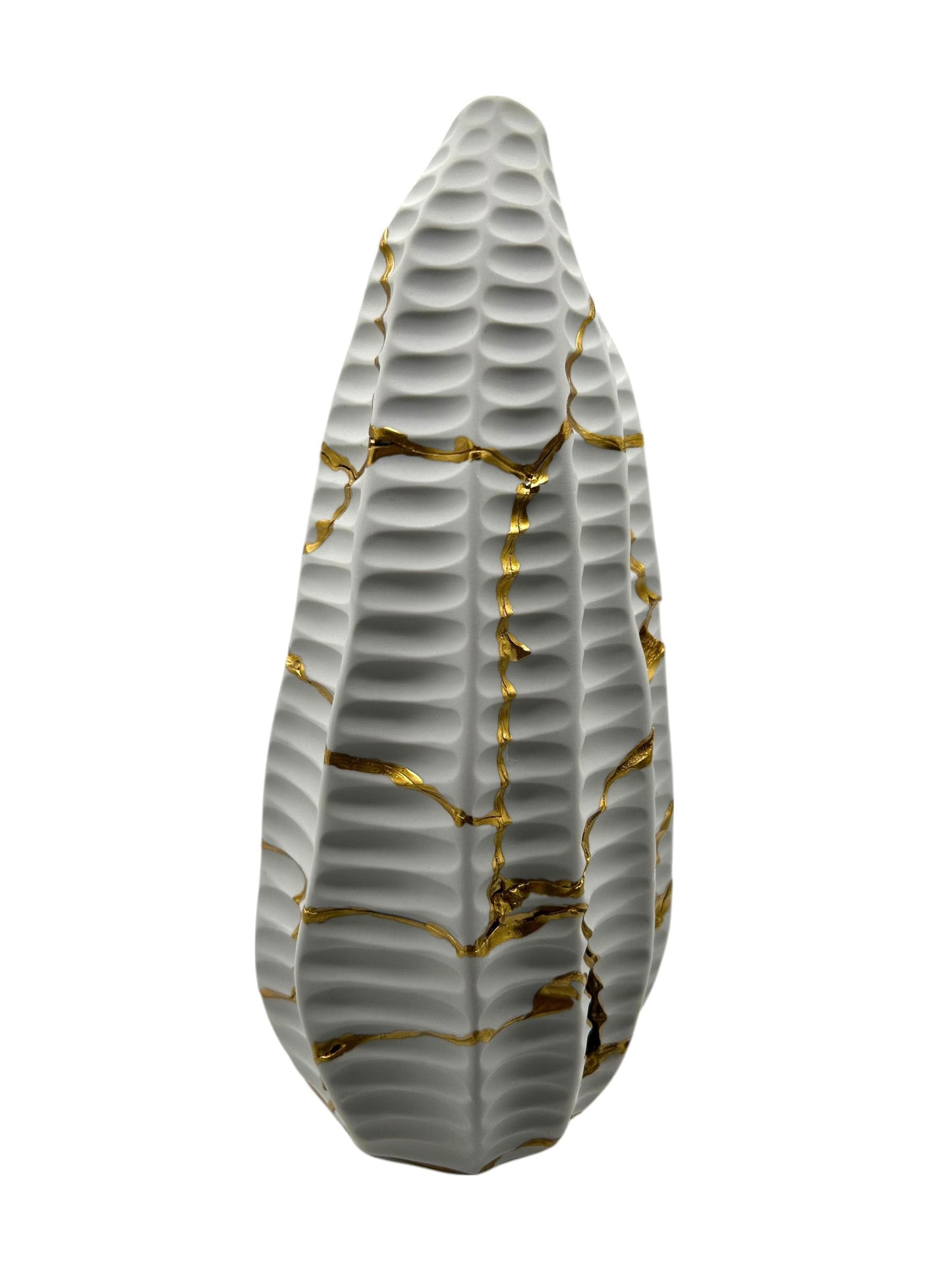 White handcrafted pottery vase with textured surface and gold kintsugi repair lines on a plain white background