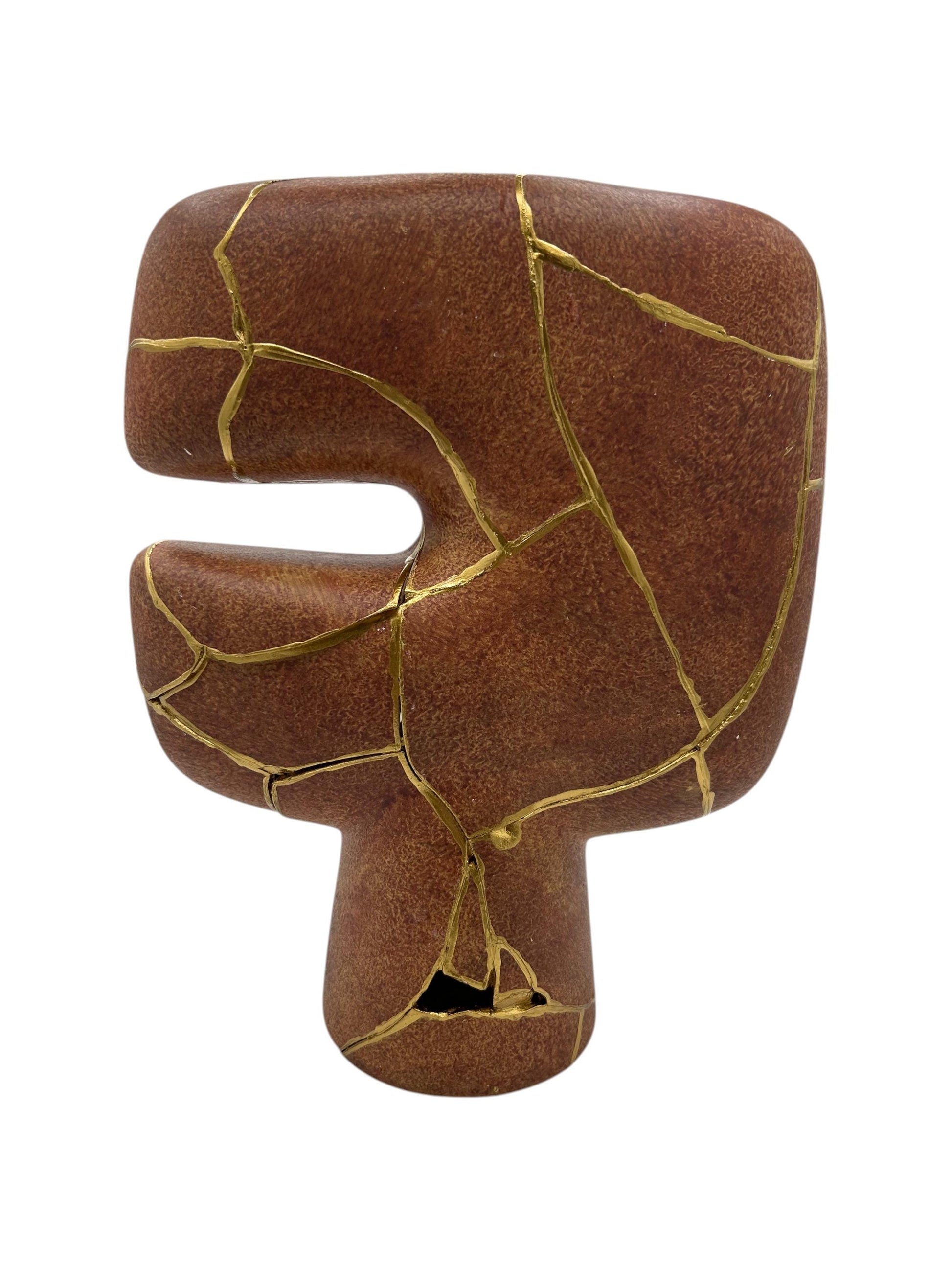 Modern broken brown kintsugi vase with hand-painted gold repair lines, abstract tribal shape, 10in tall, Japanese pottery style.