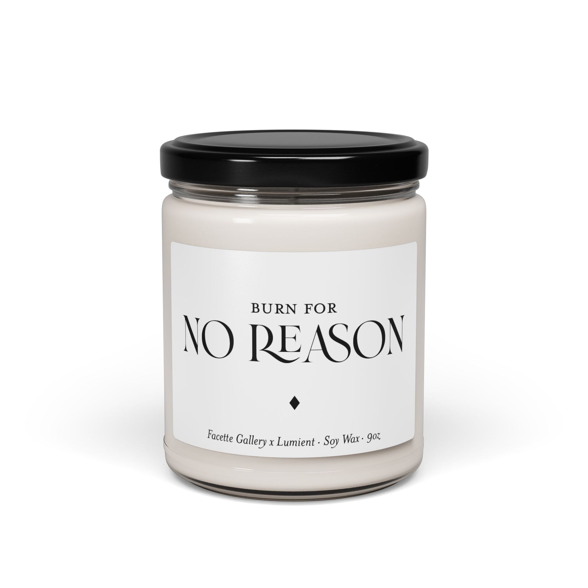 9oz white soy candle in clear glass jar with black lid, labeled "Burn for No Reason" by Facette Gallery