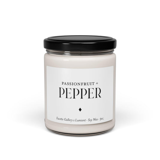 Passionfruit + Pepper soy wax candle in clear glass jar with black lid and minimalist white label, 9oz size