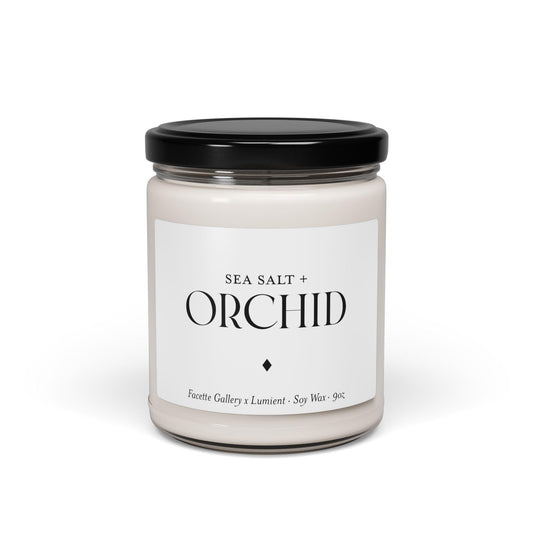 9oz white soy candle in clear glass jar with black lid, labeled Sea Salt + Orchid, minimalist design.
