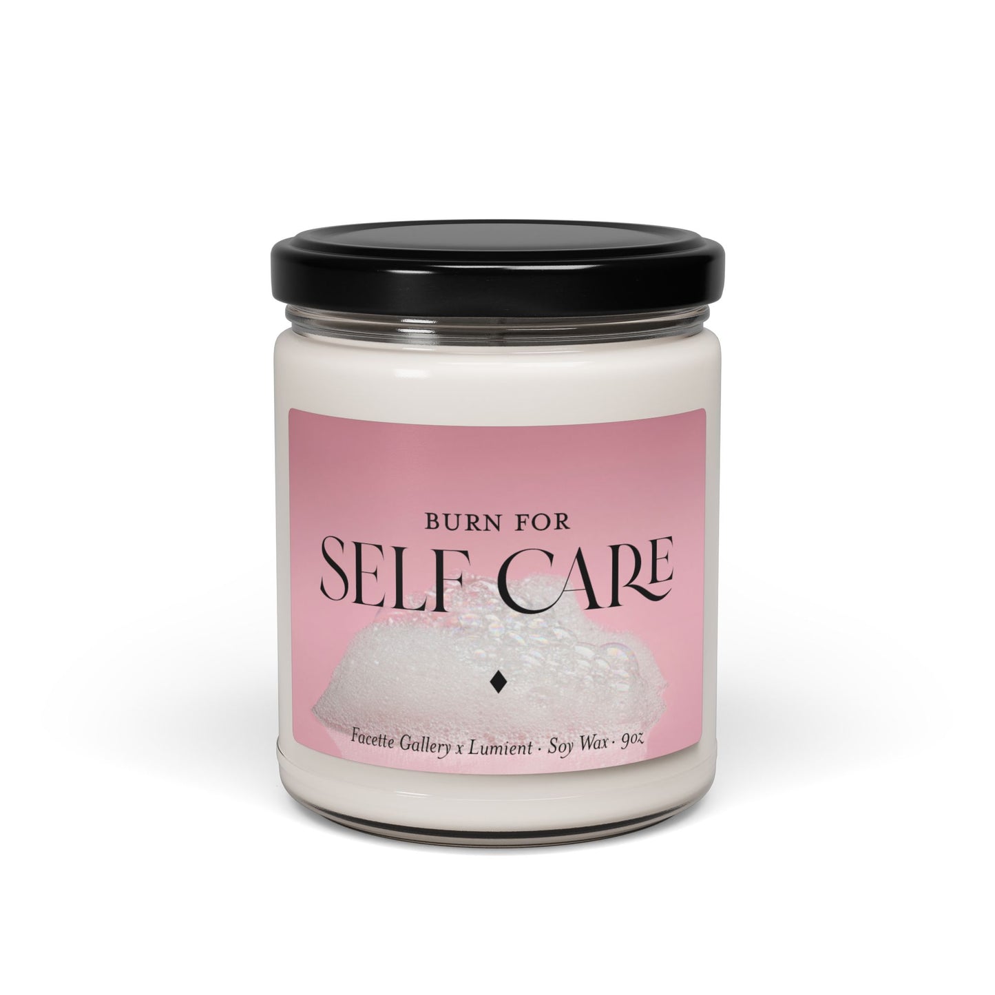 9oz self care candle in clear glass jar with black lid and pink bubble bath label, soy wax blend