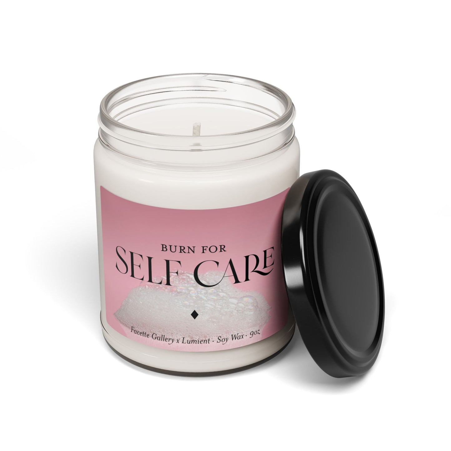 Self care candle in 9oz clear glass jar with pink bubble bath label and black lid on white background